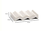 White zig-zag shaped OBA Ceramic soap dish on the white background with dimensions: 1.6 cm x 6.4 cm x 9.2 cm.