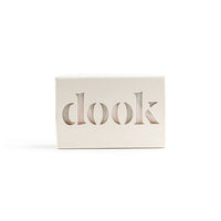 Creamy-white, recycled paper soap box with dook logo on the white background.