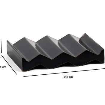 Black zig-zag shaped OBA Ceramic soap dish on the white background with dimensions: 1.6 cm x 6.4 cm x 9.2 cm.