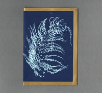 A greeting dark blue card with a white seaweed ((fern like) print,