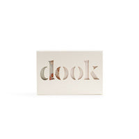A box with the dook logo of a bar of soap on the white background.