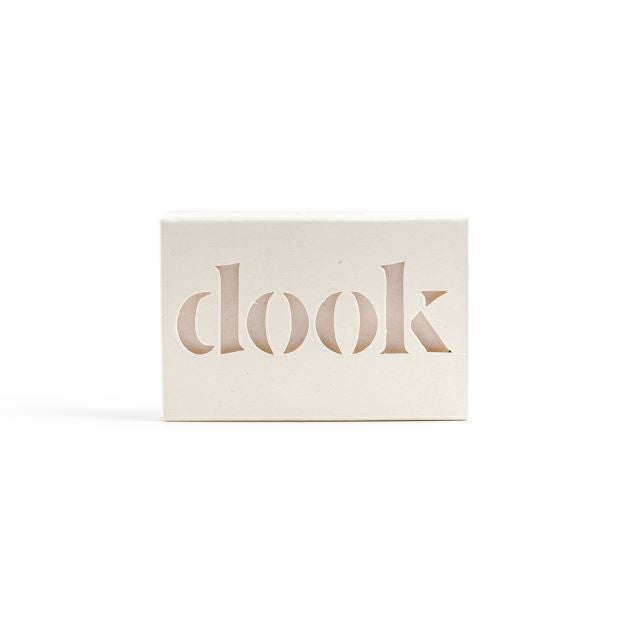 A single box of a bar of soap on the white bacground.