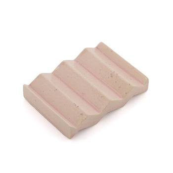 Light pink zig-zag shaped OBA Ceramic soap dish on the white background top view.