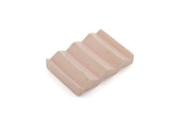 Light pink zig-zag shaped OBA Ceramic soap dish on the white background top view.